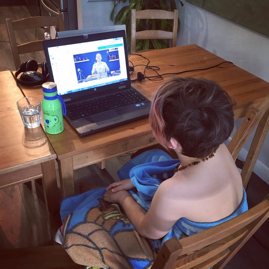 student enjoying the solar system online unit study from the techie homeschool mom