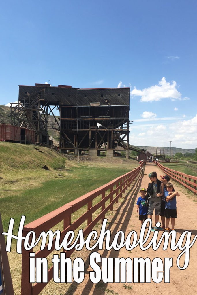 four male children stand on a beautiful stone path that leads to a closed down coal mine in drumheller alberta.  The warm weather is here, public schools are out.  Are you homeschooling in the summer?  For us, learning never stops, the opportunities just change.