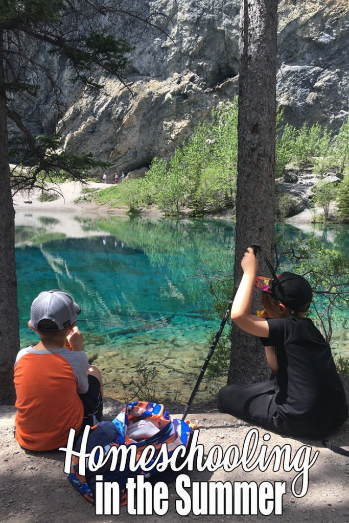 Two children stare out at the beautiful turquoise water of Grassi Lakes in Canmore Alberta. The warm weather is here, public schools are out. Are you homeschooling in the summer? For us, learning never stops, the opportunities just change.