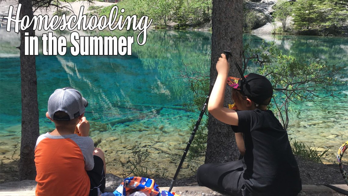 Two children stare out at the beautiful turquoise water of Grassi Lakes in Canmore Alberta. The warm weather is here, public schools are out. Are you homeschooling in the summer? For us, learning never stops, the opportunities just change.